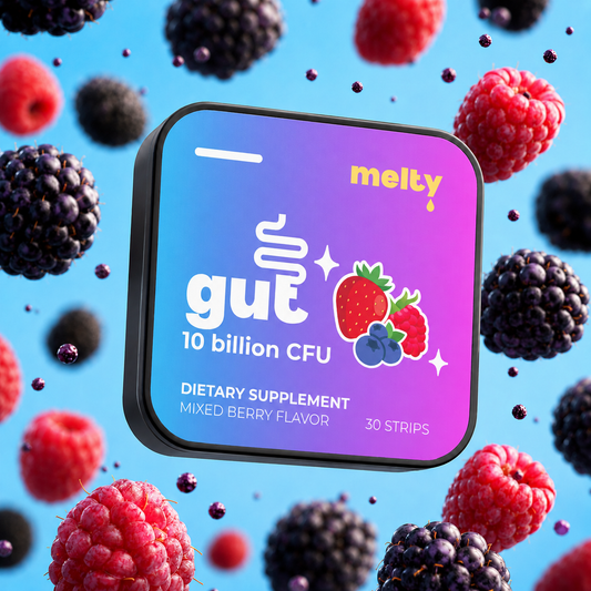 Melty gut health oral strip supplement with 10 billion CFU probiotics, blue-to-purple gradient packaging surrounded by fresh mixed berries on a bright blue background
