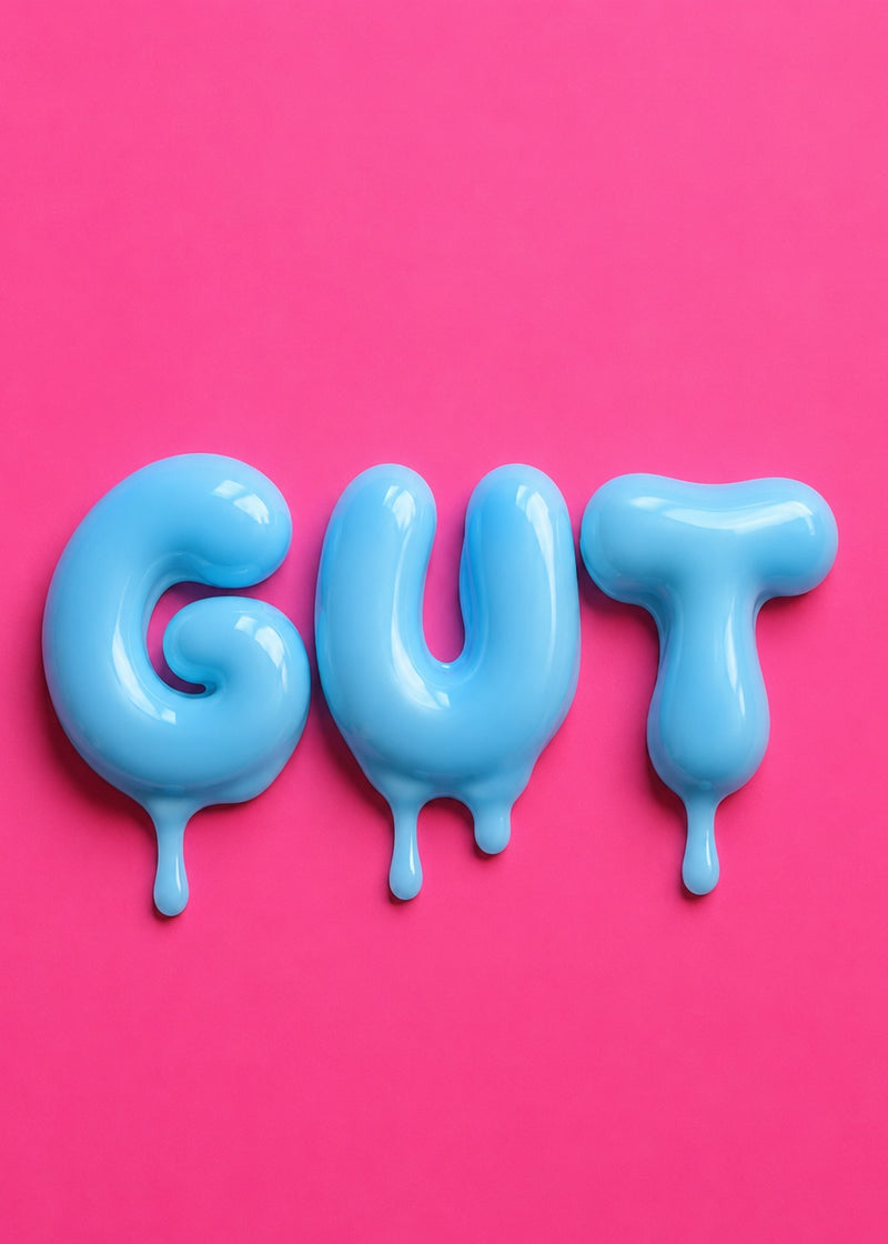 GUT spelled in glossy blue letters on pink background