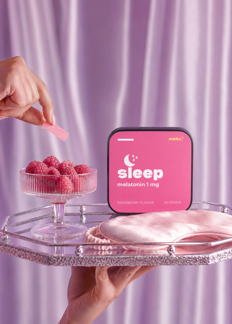 Melty sleep tin with raspberries on a mirrored tray