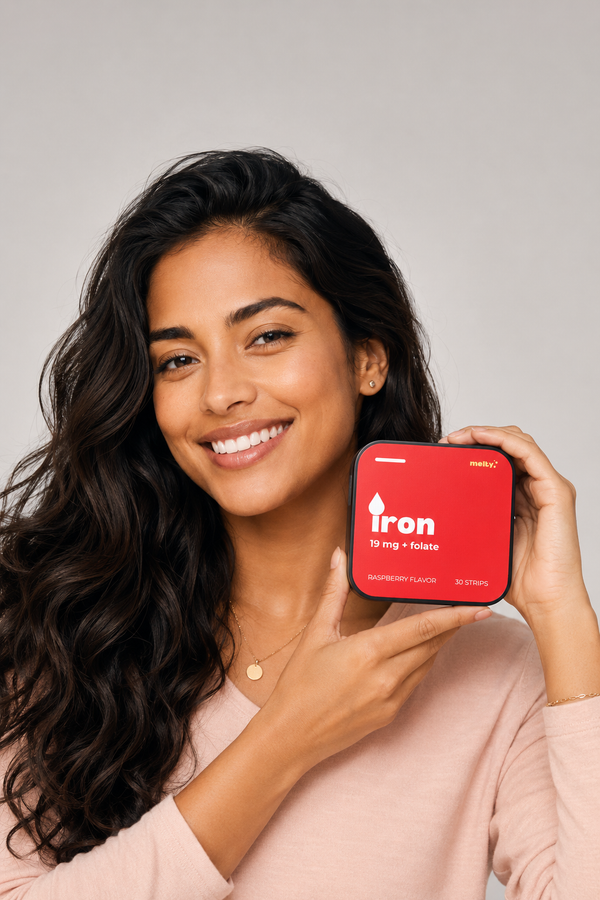 Woman holding melty iron strips container