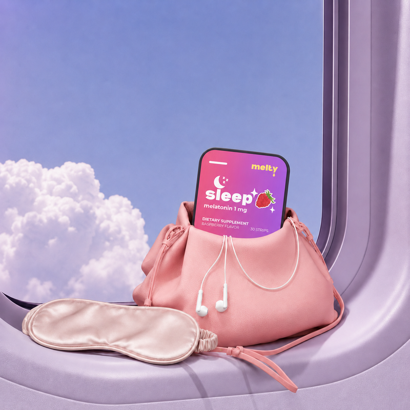 Sleep strips travel pouch with eye mask on airplane window sill
